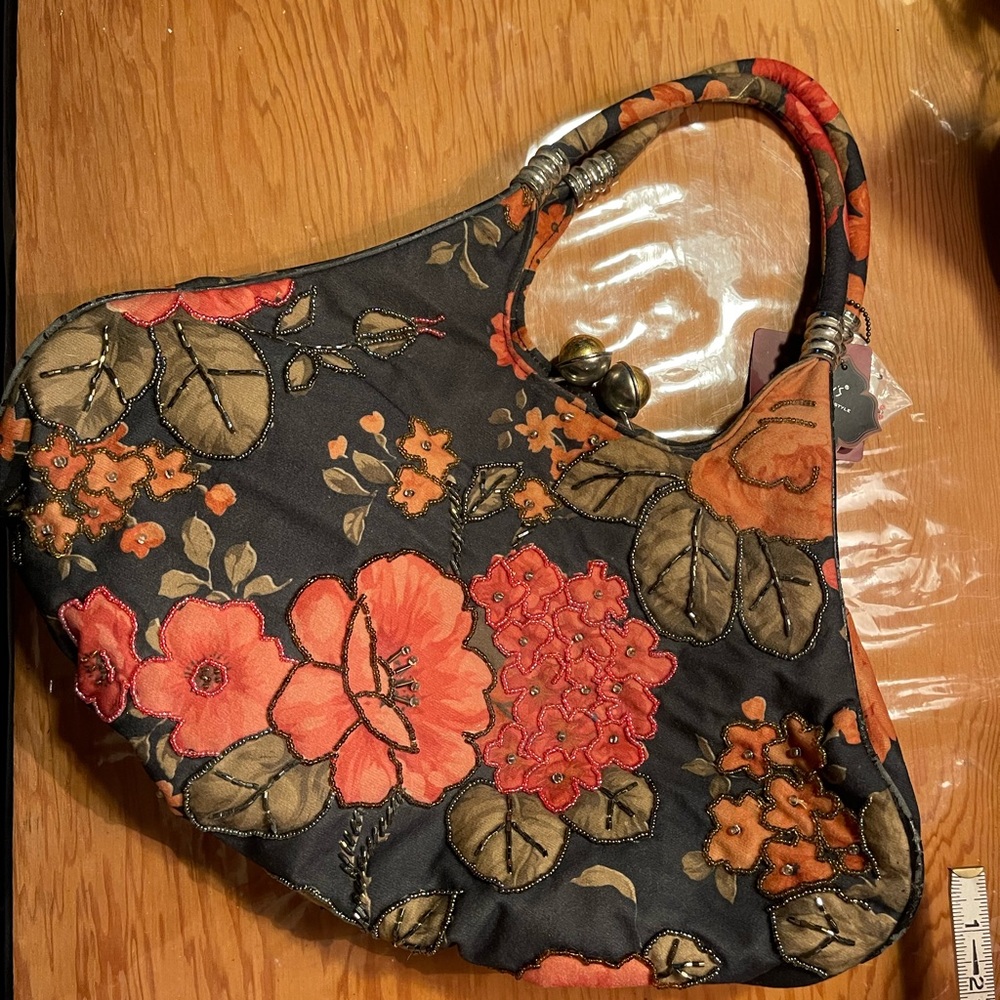 In’s fabric beaded handbag